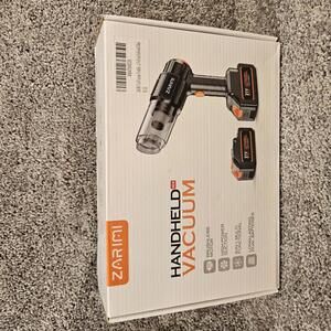 ZARIMI black handheld cordless vacuum. Dual batteries. 6 n 1 functions. NIB